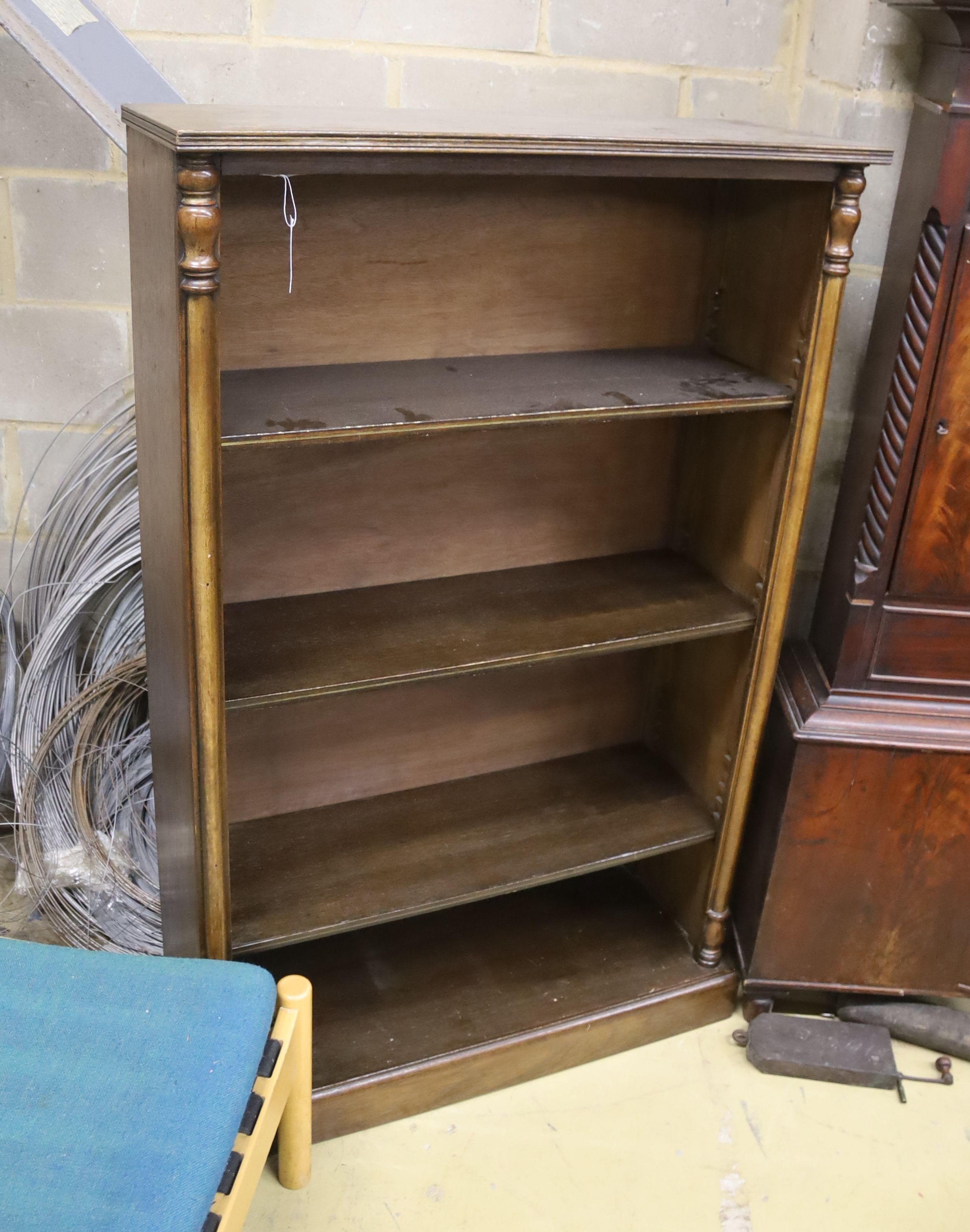 A reproduction Victorian style mahogany open fronted bookcase, length 82cm, depth 30cm, height 132cm